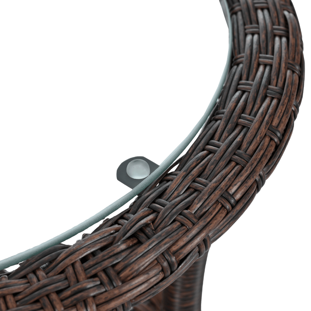 Close-up of a wicker chair with a green background