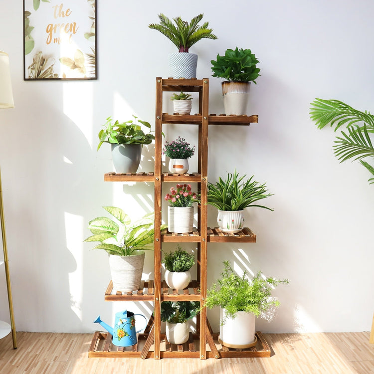 Indoor 6-tier pine wooden plant stand with assorted potted plants; easy-assembly for home decor.