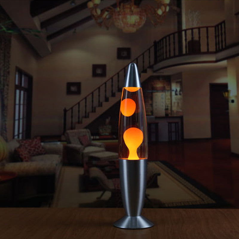Night Light Wax Lamp With Colorful Wax Ball Motion with a blurred living room background