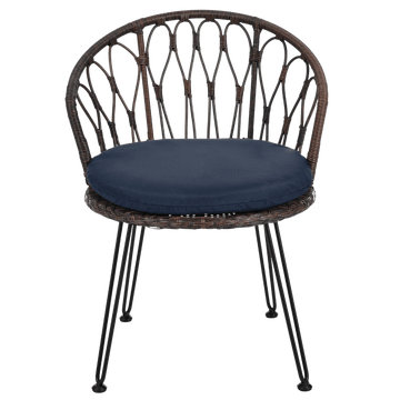 Two wicker chairs with navy cushions and a matching side table on a white background