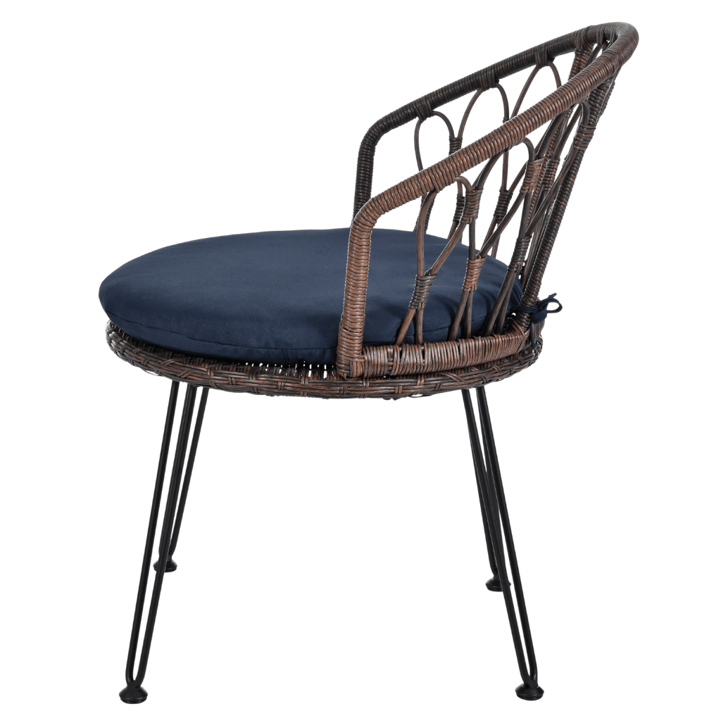 Wicker chair with a navy cushion on a transparent background