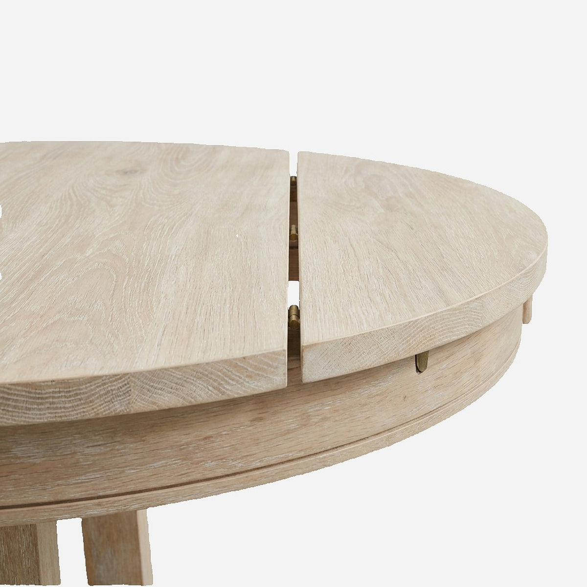 Center seam where the table opens for its leaf (close-up detail)