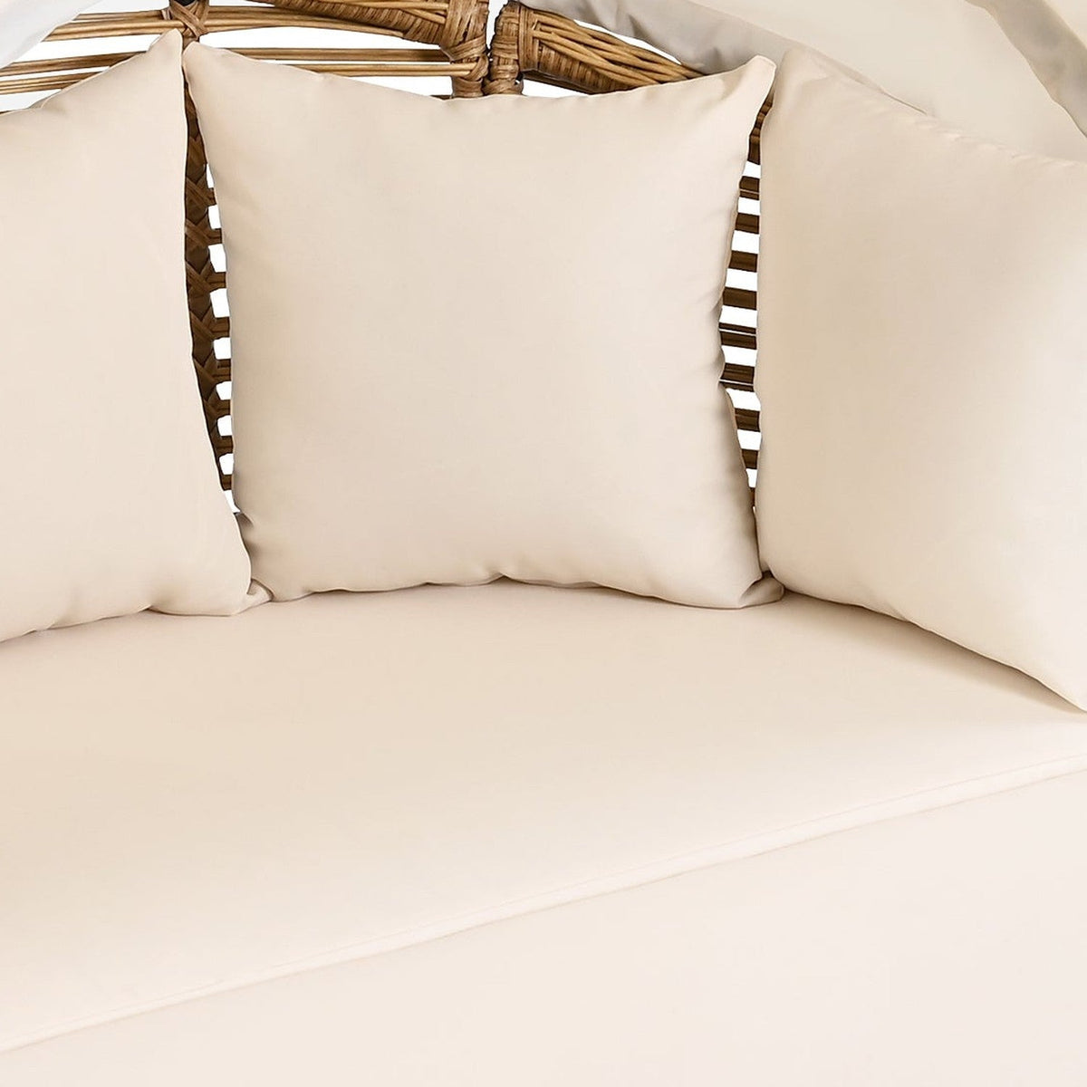 Close-up of the cushion and three pillows