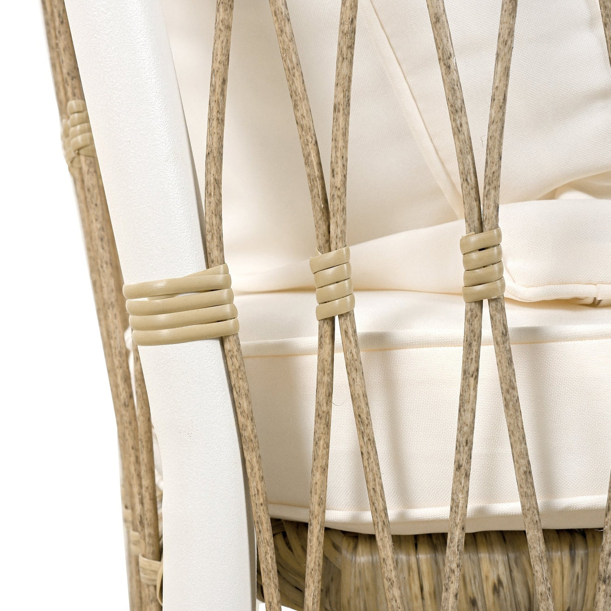 Rattan bindings wrapped on the white iron chair back (close-up detail)
