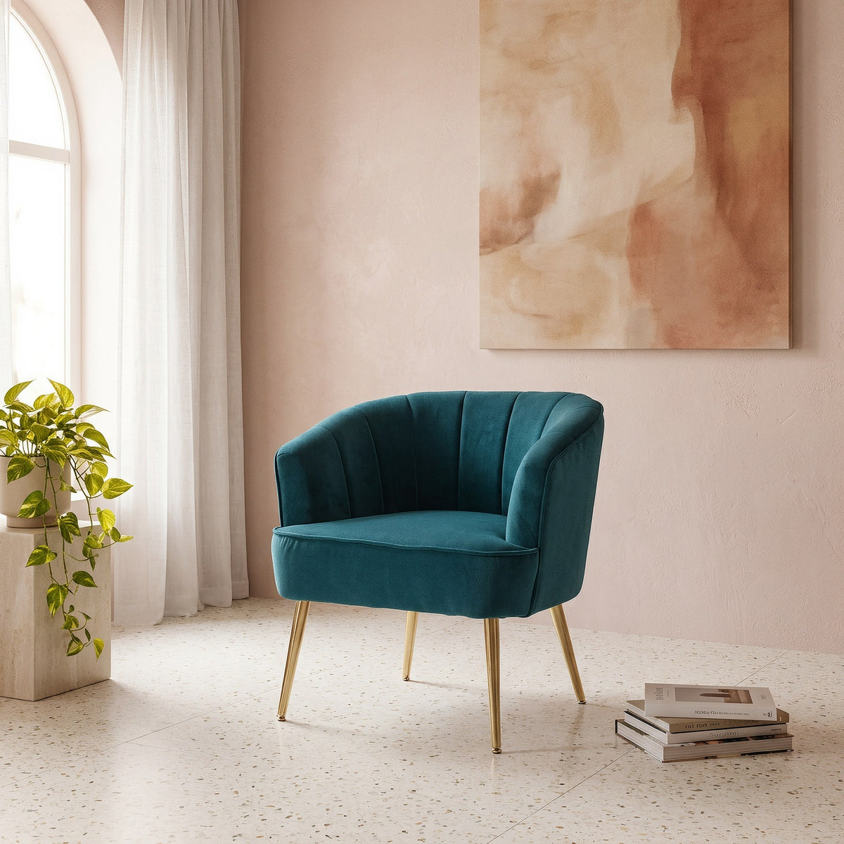 Teal velvet barrel accent chair beside sheer curtains in a bright apartment corner