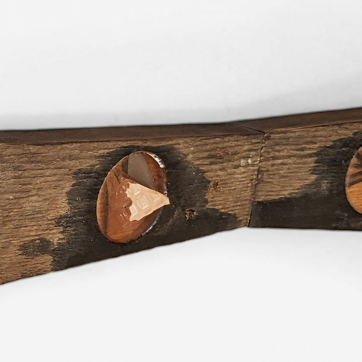 Close-up of copper pipe pieces set in resin