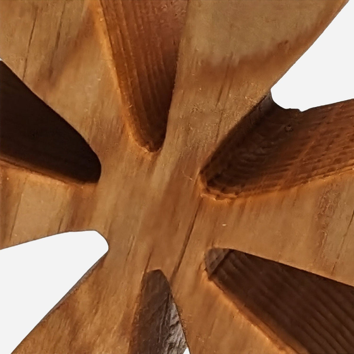 Centre grain where the six arms of a wooden starburst bookend meet