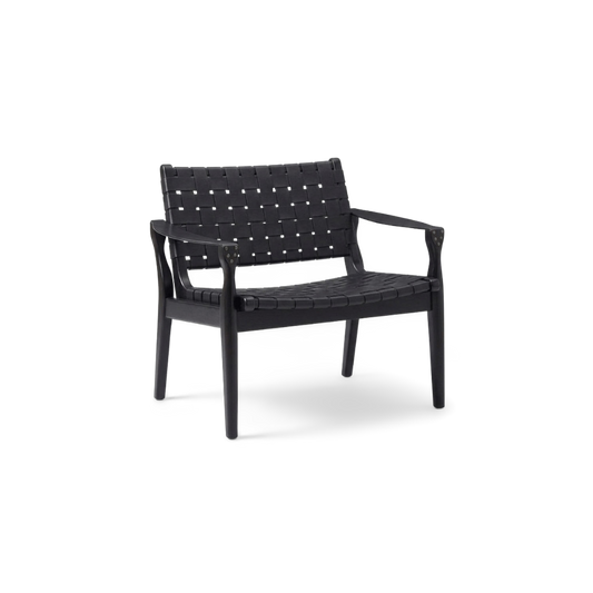 Woven faux leather accent chair at a three-quarter angle (plain studio)