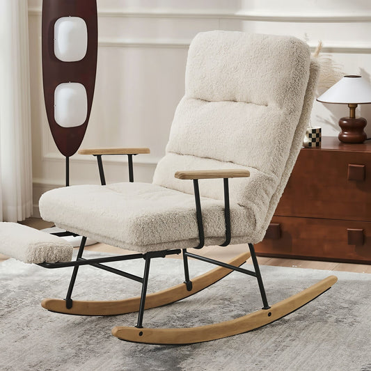 Cream sherpa rocking chair with wood rockers and a footrest beside a walnut dresser