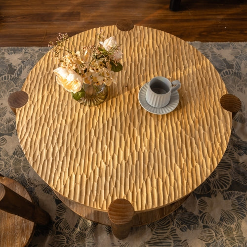 Round solid wood coffee table, overhead tabletop styling