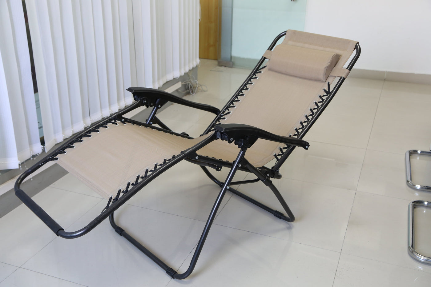 Value set of 2 beige foldable Zero Gravity recliners with removable side trays; portable high-strength chairs for poolsides or sunrooms.