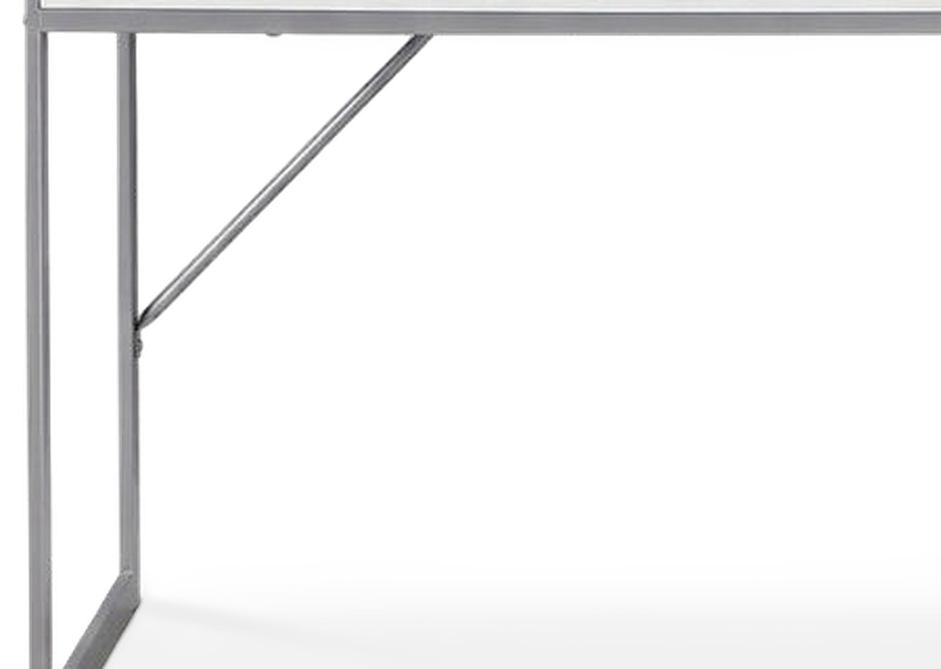 White silver metal computer desk, leg brace joint close-up