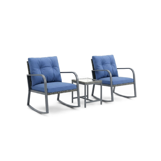 Blue-cushioned steel rocking chairs with a glass-top wicker side table, angled view, studio background (plain studio)