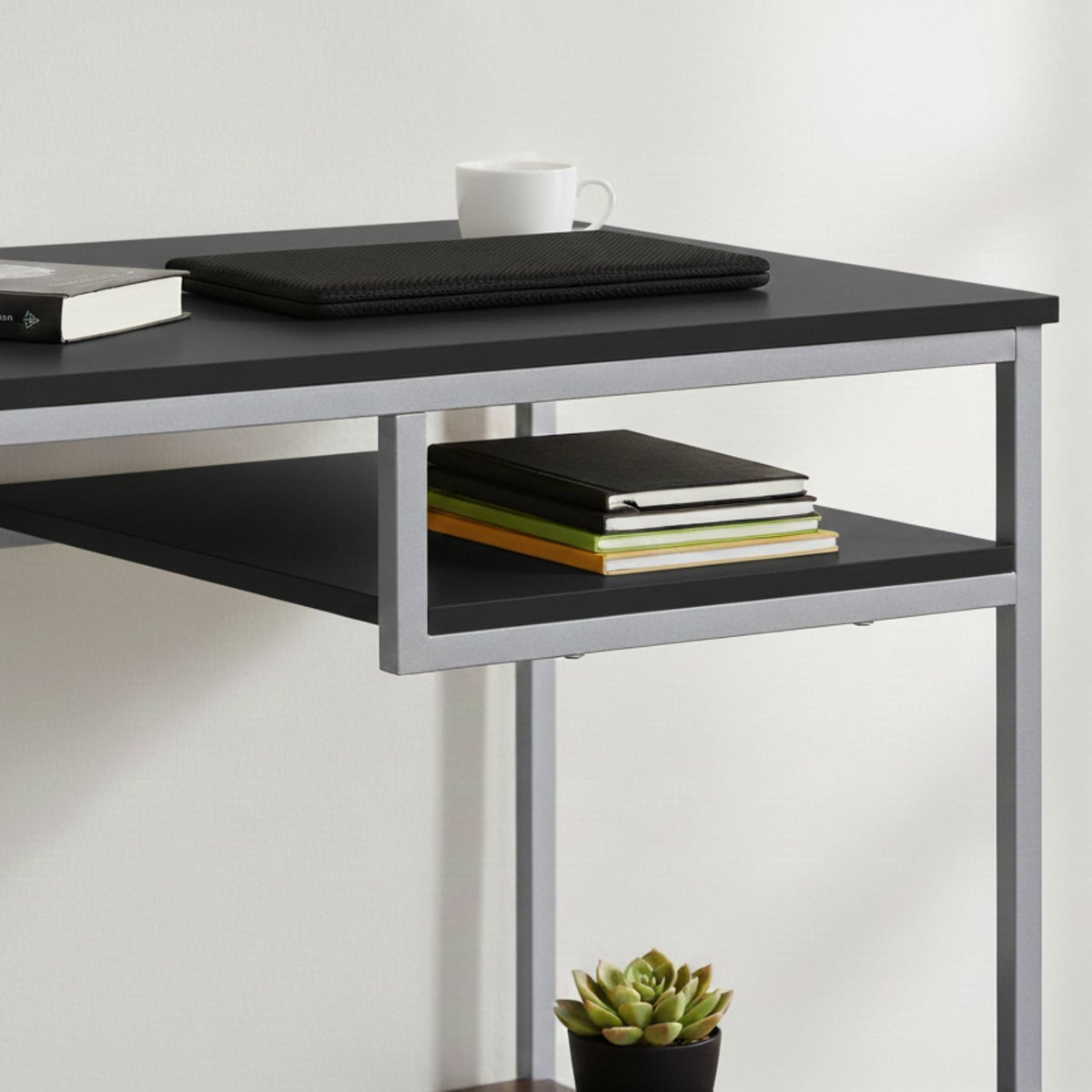 Durable 30-inch white MDF and white metal computer desk with a lower shelf for books (close-up detail)