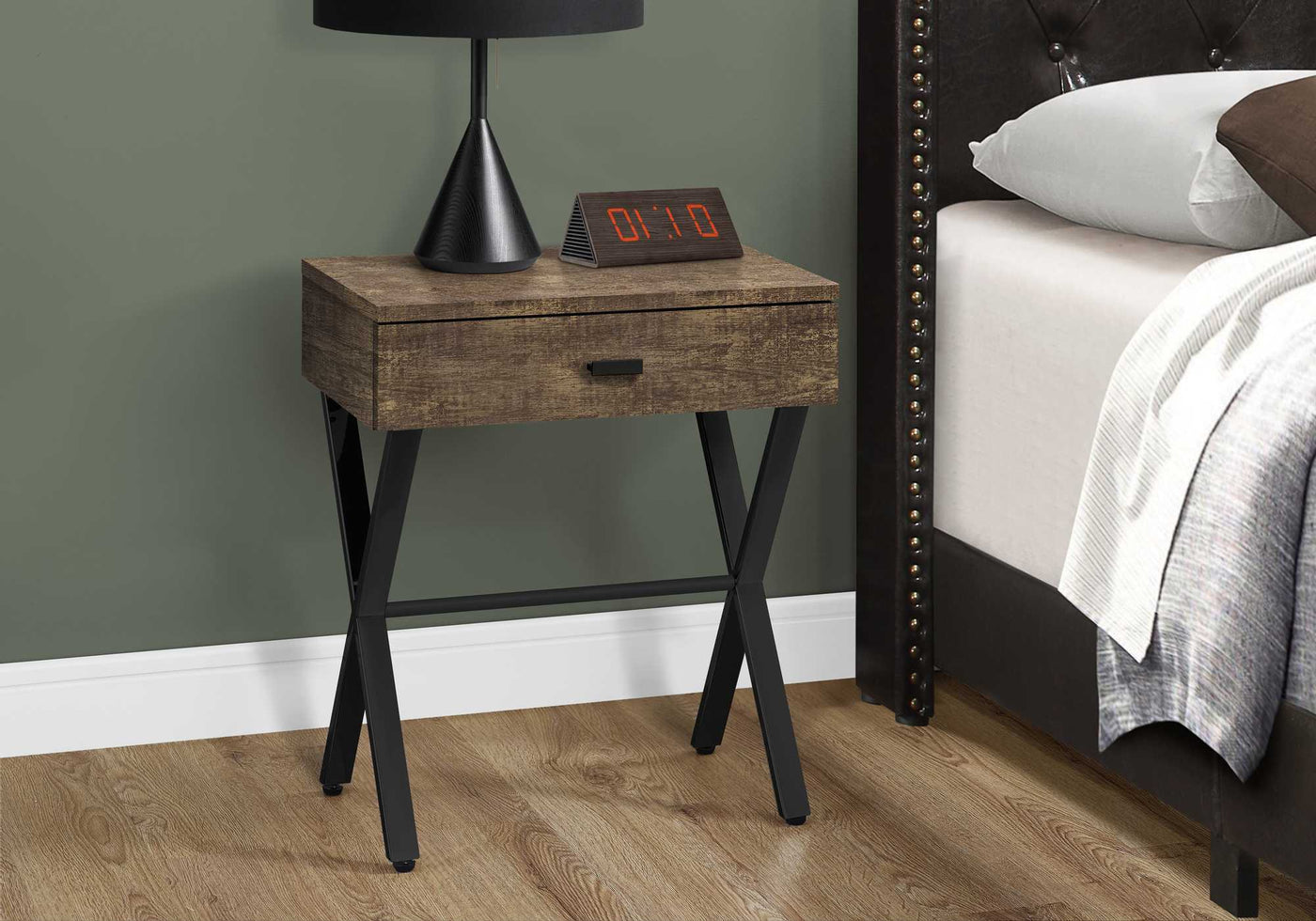 Sleek dark taupe finish table with chrome metal accents and drawer beside bed with lamp.