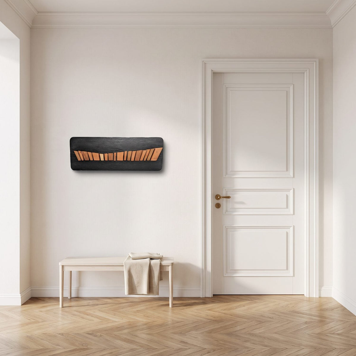 Wood relief wall panel beside a white door in a bright entry hall