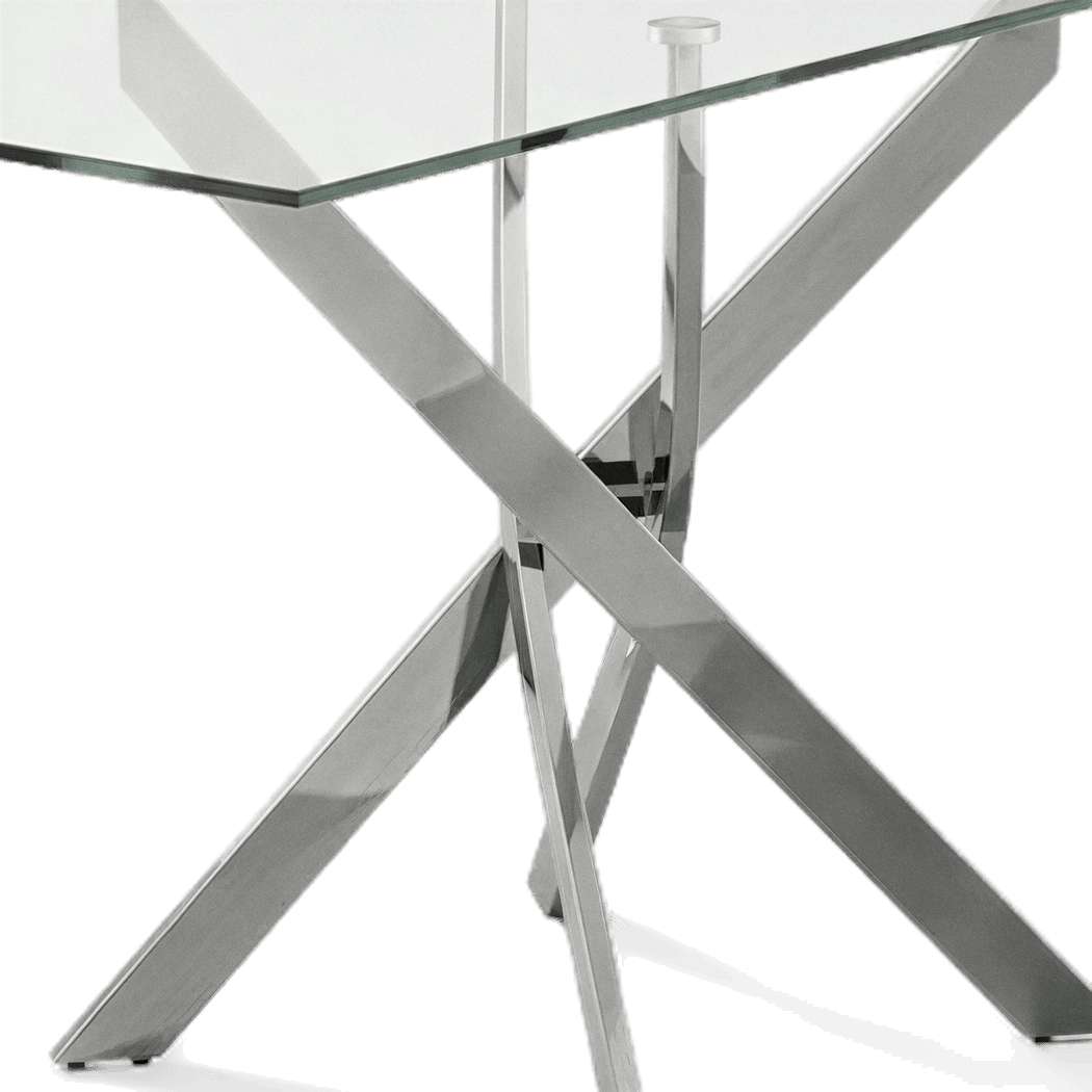 Close-up detail of the polished chrome legs crossing beneath the glass top