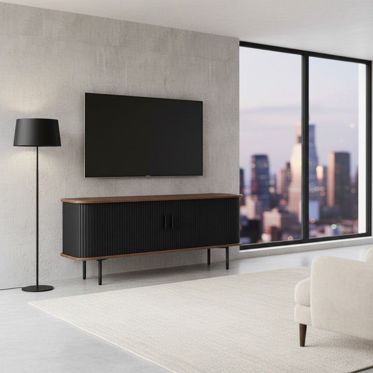 47-inch black TV stand with sliding doors, storage, wood top, and slim legs in a modern living room.