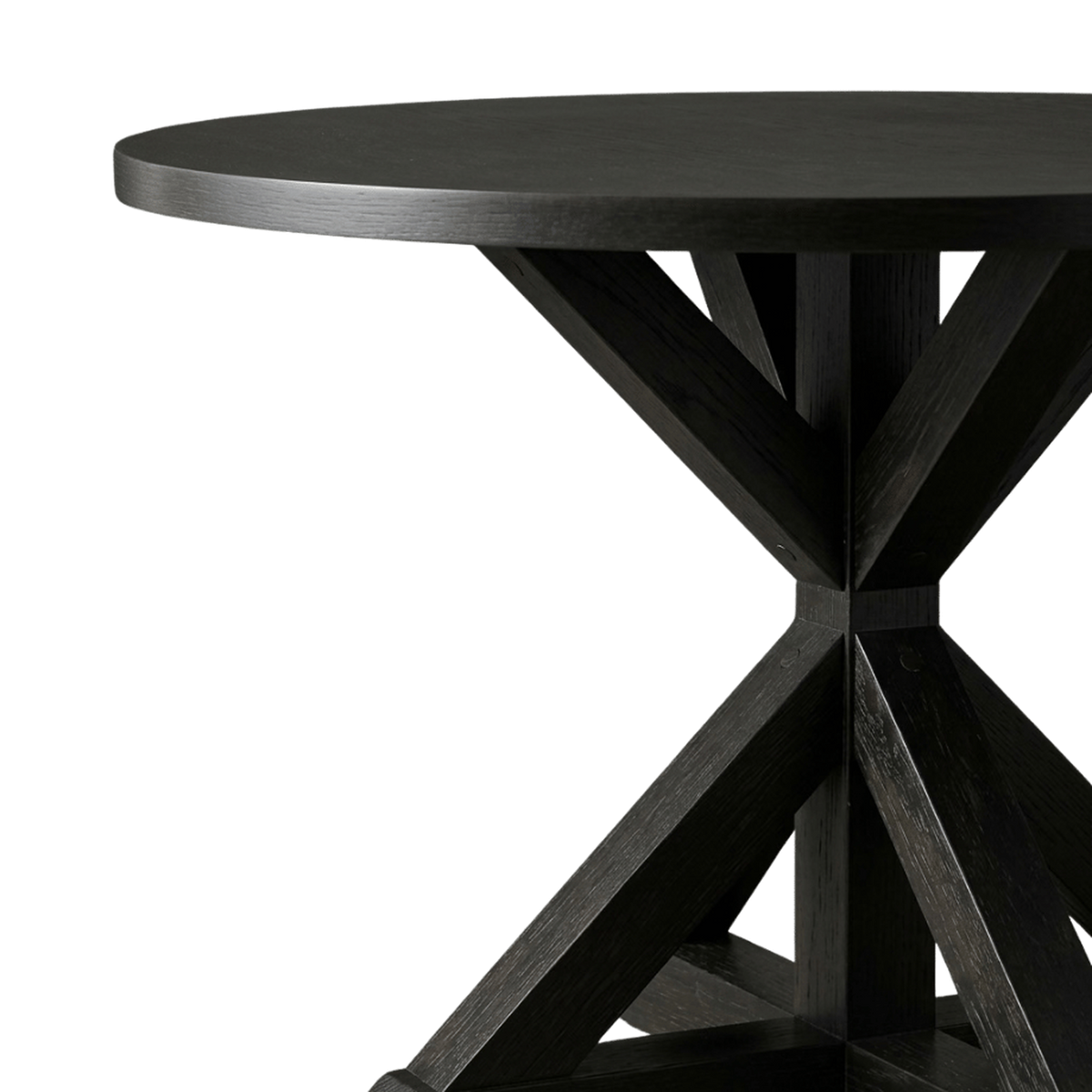 Close-up of the thick black oak-veneer top edge over the X base (close-up detail)