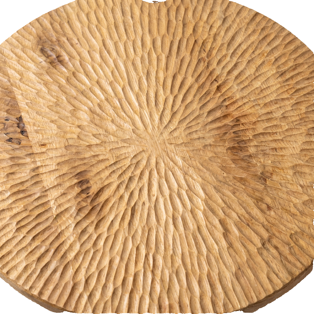 Round solid wood coffee table, carved tabletop texture close-up
