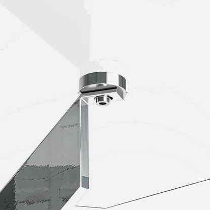 Close-up detail of the chrome cap where a leg meets the underside of the glass