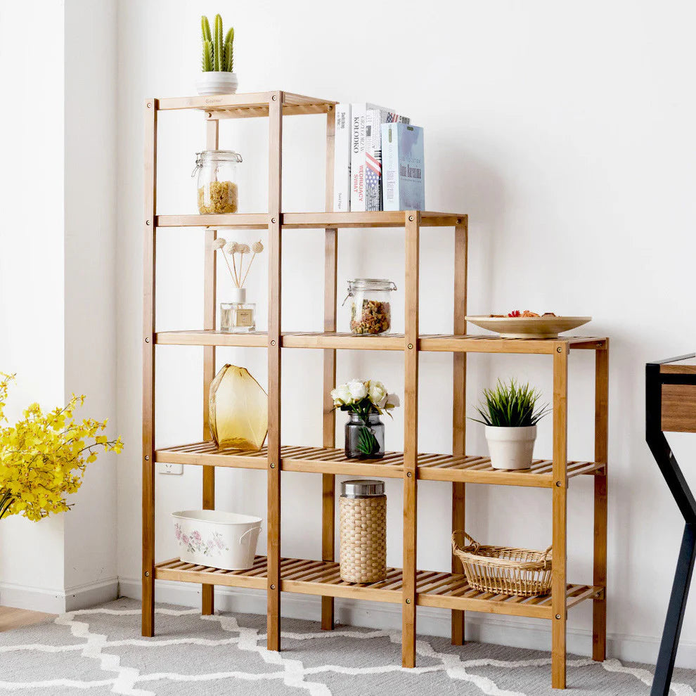 Bamboo wood five-tier bookcase plant stand with open slatted shelves for books, plants, and decor.