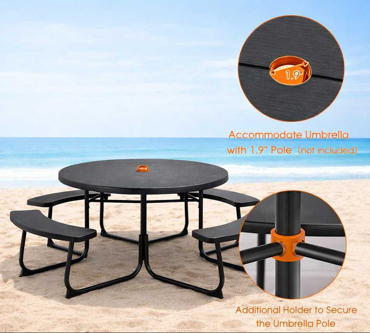Black Outdoor HDPE Picnic Table Bench Set with Umbrella Hole on beach, weather-resistant, seats eight.