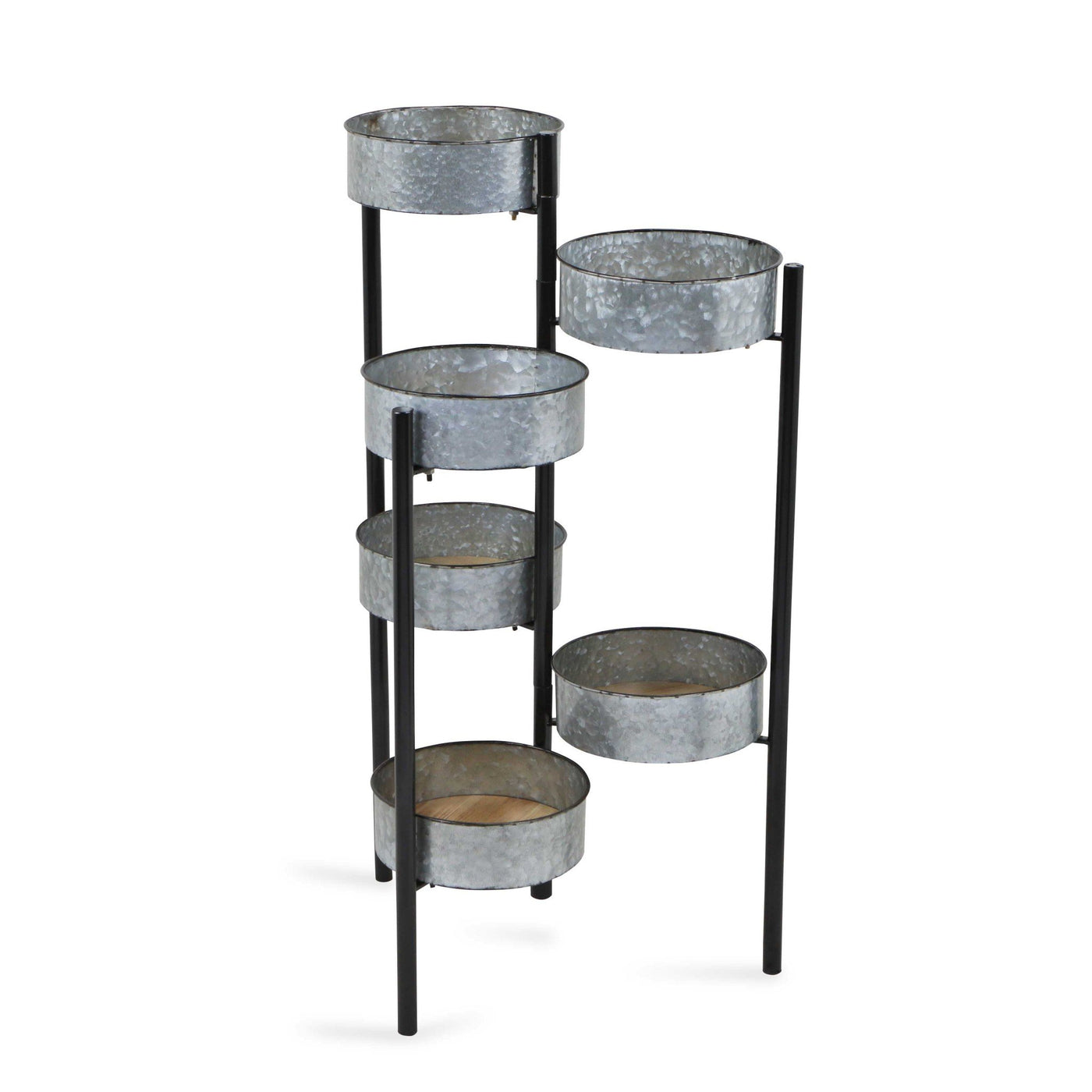 Black metal plant stand with galvanized pots on a white background