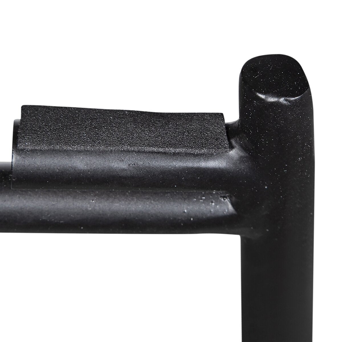 Close-up of a black metal handle on a white background