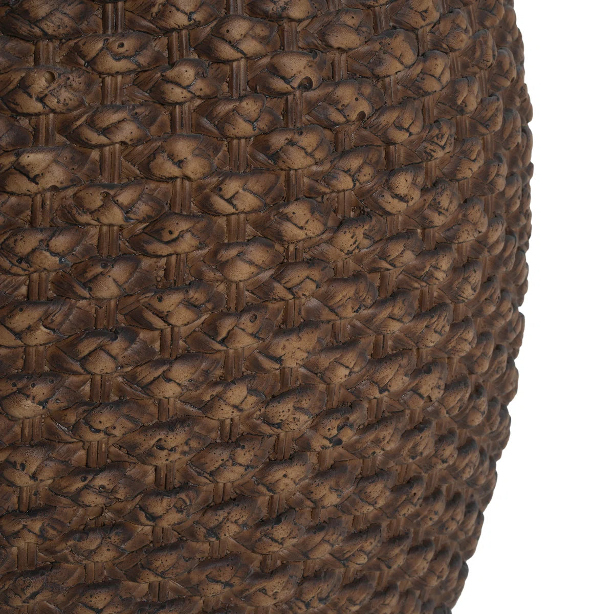 Close-up of brown faux rattan weave on a side table for indoor and outdoor use.