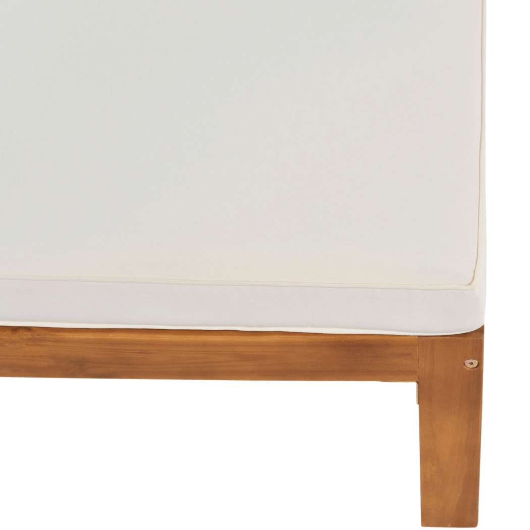 close-up of zippered cushion edge on acacia sofa frame (close-up detail)