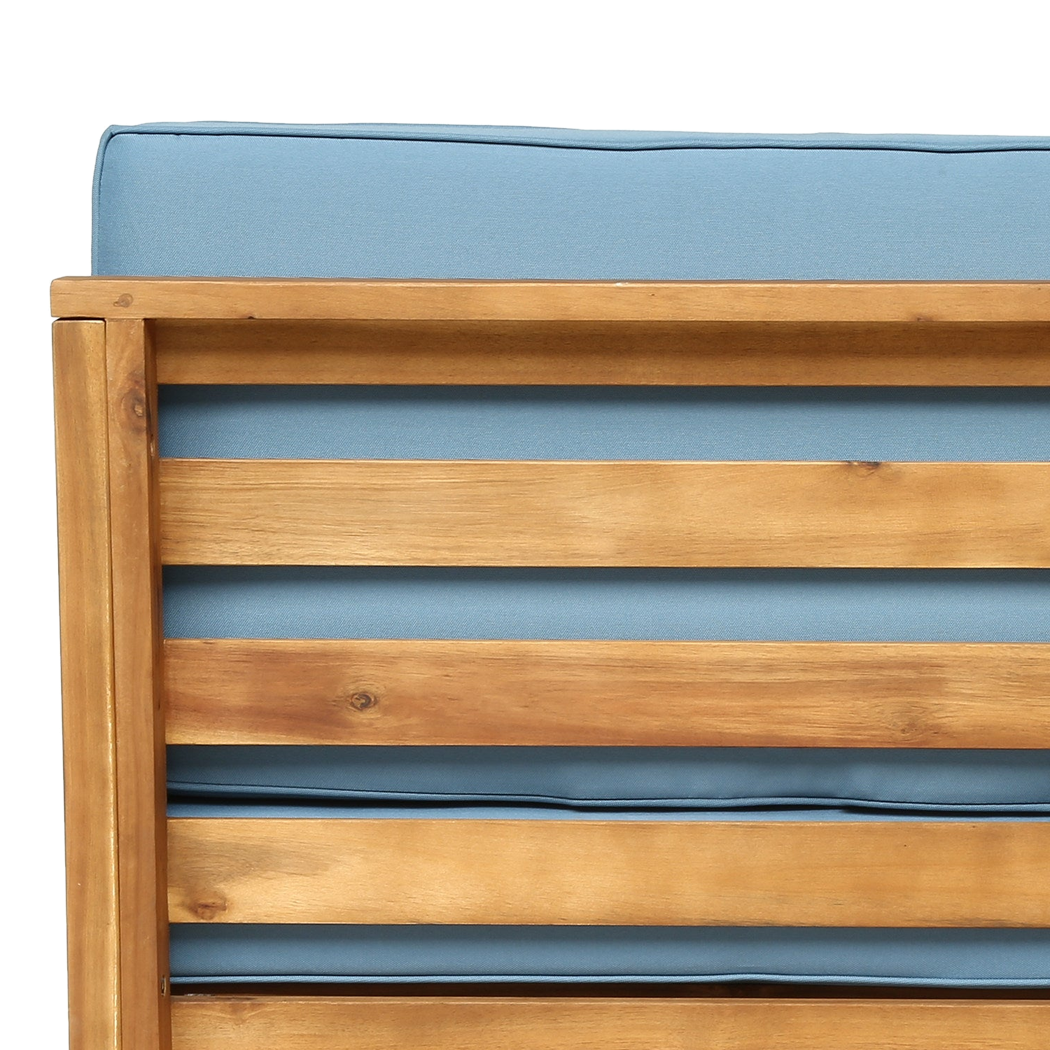 Close-up of the open acacia slat back panel with cushion showing through the gaps (close-up detail)