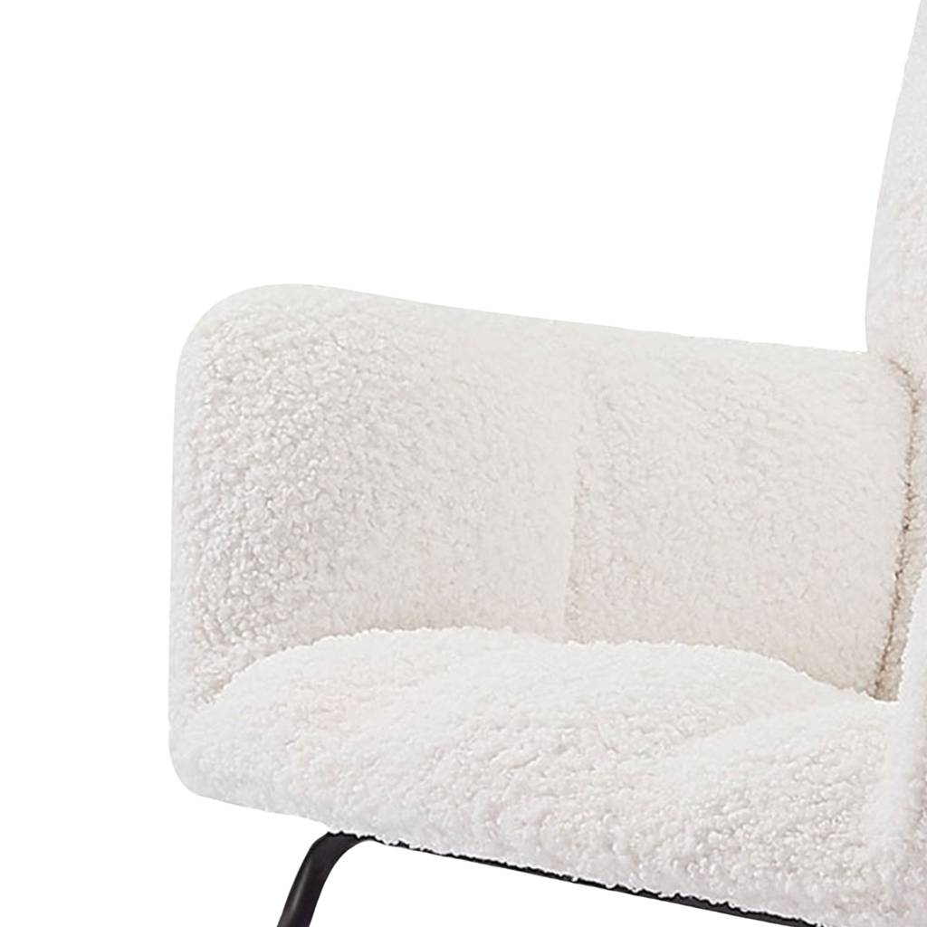 Cream boucle rocking chair with high backrest and black legs, ideal living room centerpiece.