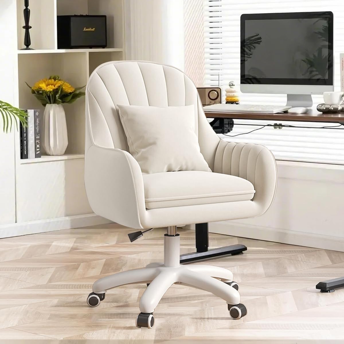 Cream velvet mid-back office chair with adjustable height, curved back, cushioned seat, and wheeled base.