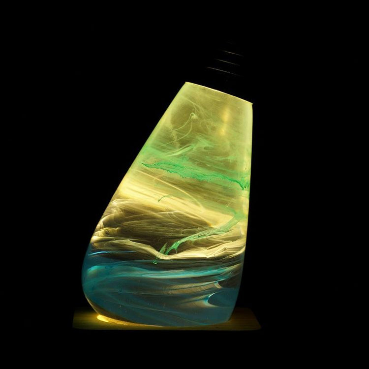 Decorative lamp with a wavy design on a black background