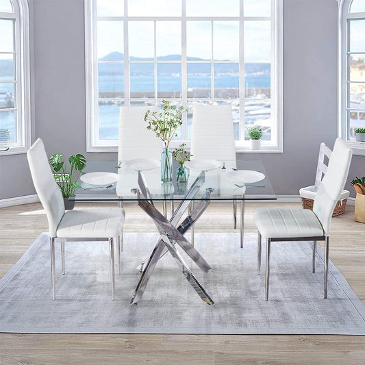 Dining room with glass table and white chairs in a bright room with large windows.
