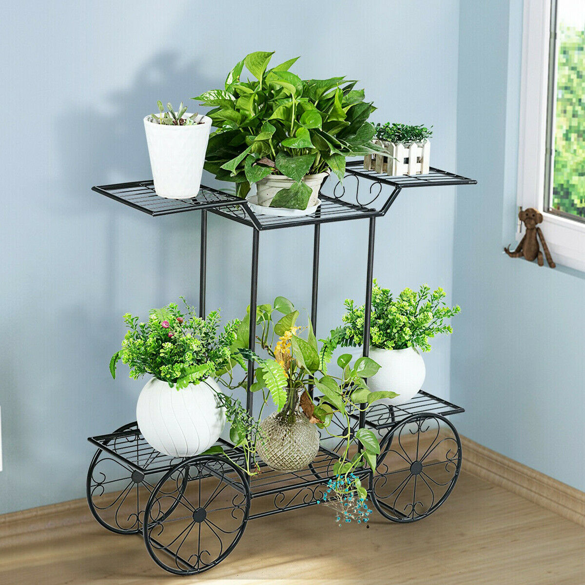 Durable six-tier garden cart plant holder on wrought-iron stand with potted plants and wheels.