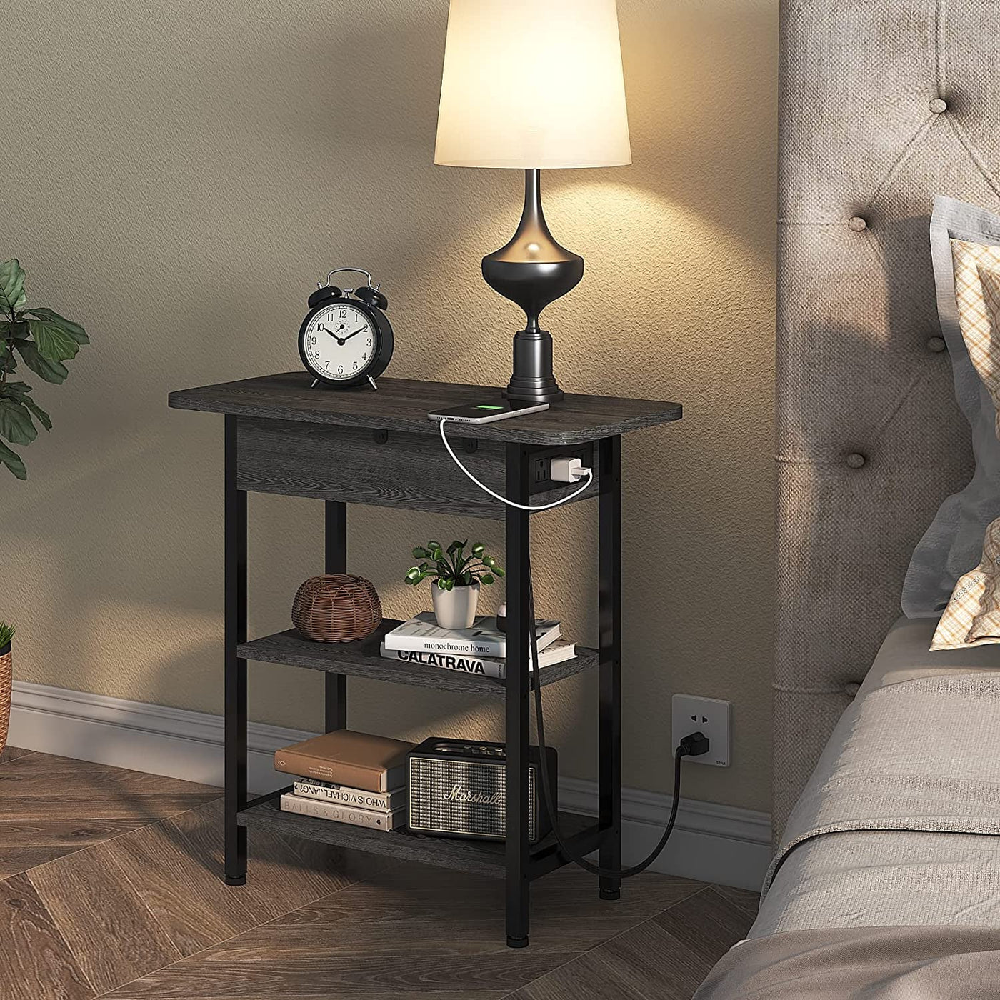 End table with flip-top left-side charging station, USB ports and two outlets beside bed 