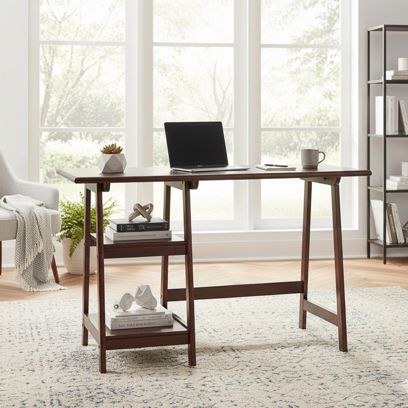 Espresso finish wood home office desk with laptop on top and a lower shelf for storage in a bright room.