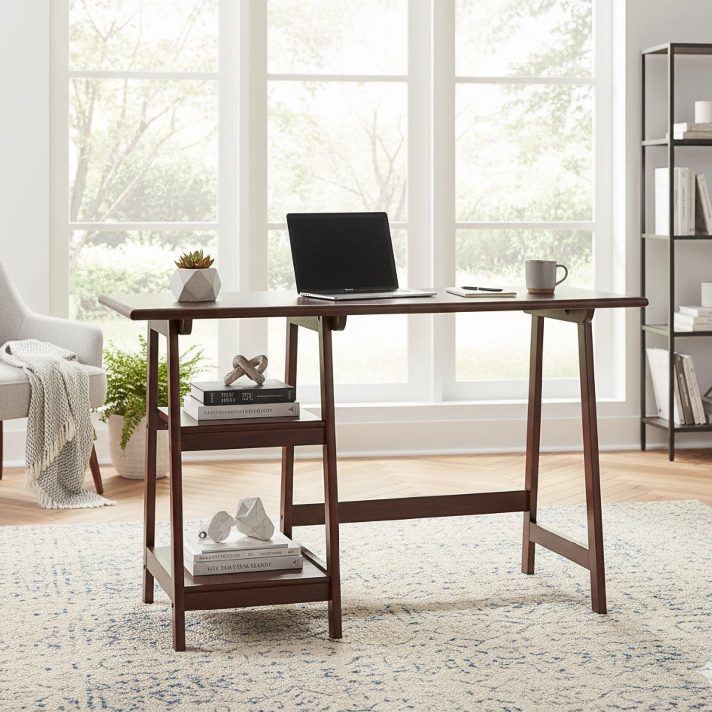 Espresso finish wood home office desk with laptop on top and a lower shelf for storage in a bright room.