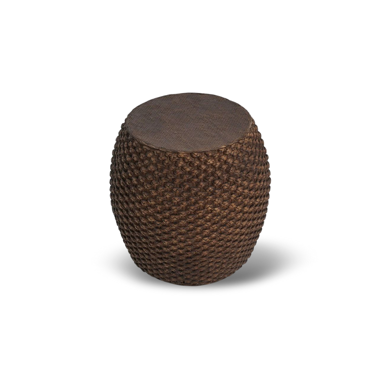 Faux rattan side table for both indoor and outdoor use with a round top and warm brown weave.