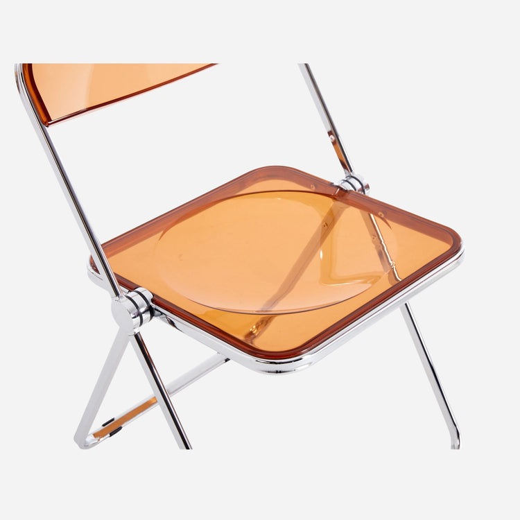Foldable chair with yellow transparent seat and backrest on a white background