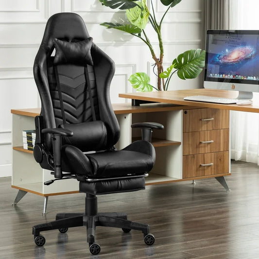 GameFitz Black Gaming Chair with fold-out foot rest, ergonomic head pillow, lumbar support, at desk.