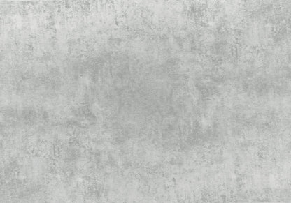 Gray concrete-textured backdrop.