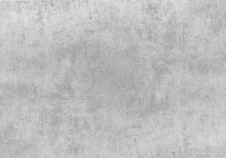 Gray concrete-textured backdrop.