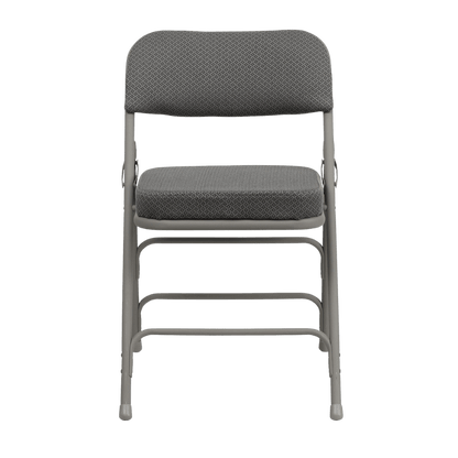 Two Hercules folding chairs with cushioned fabric seats in gray, stacked for compact storage.