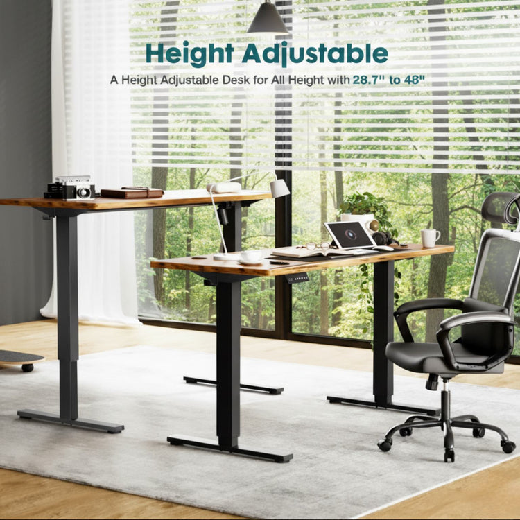 Height adjustable desk with office chair in a room 