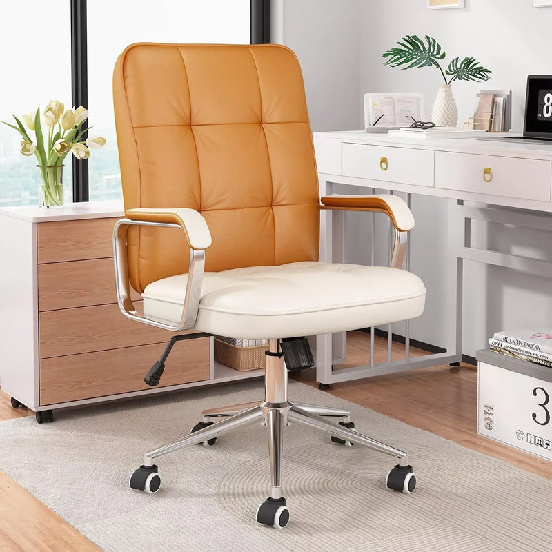 Leather computer desk chair with tan tufted back, white seat, chrome swivel base for ergonomic office use.