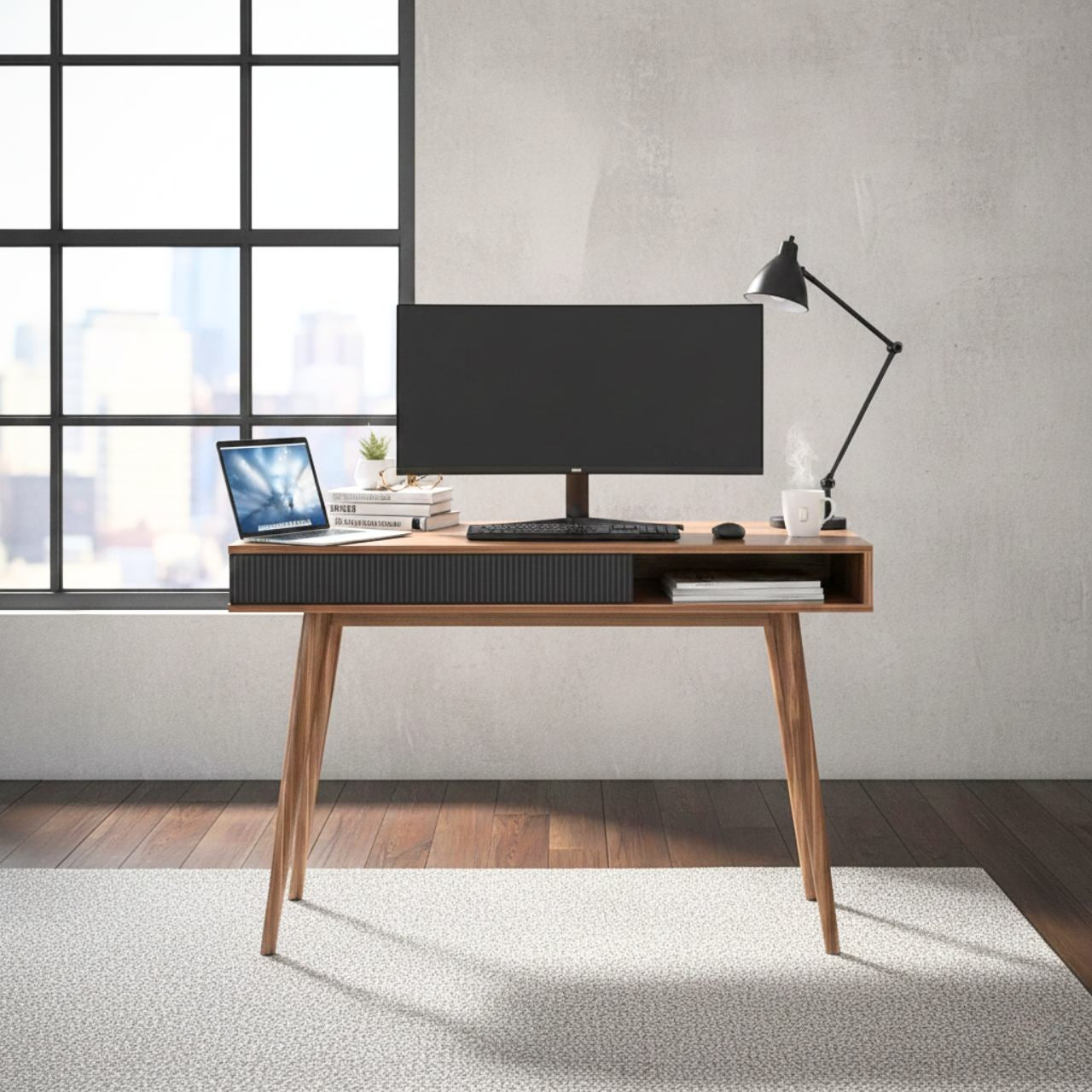 Mid Century Walnut Desk with 42.5-inch workspace, drawer, open shelf, monitor and laptop in a modern home office.