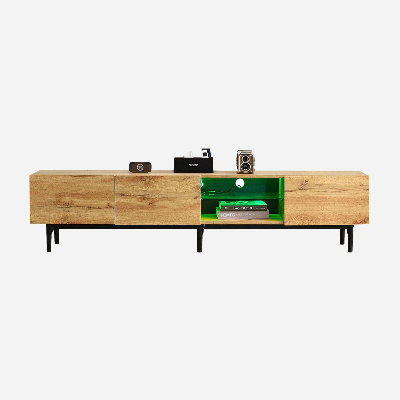 Modern TV stand with four cabinets and open central shelf, cable slot, wood finish, black metal legs.
